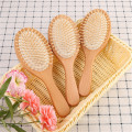 Nouveau manche en bois massage brosse à cheveux avec des broches en métal message peigne coussin d&#39;air